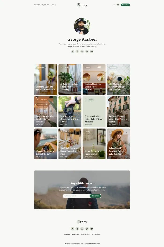 Fancy Ghost theme homepage with clean grid blog layout and dark mode